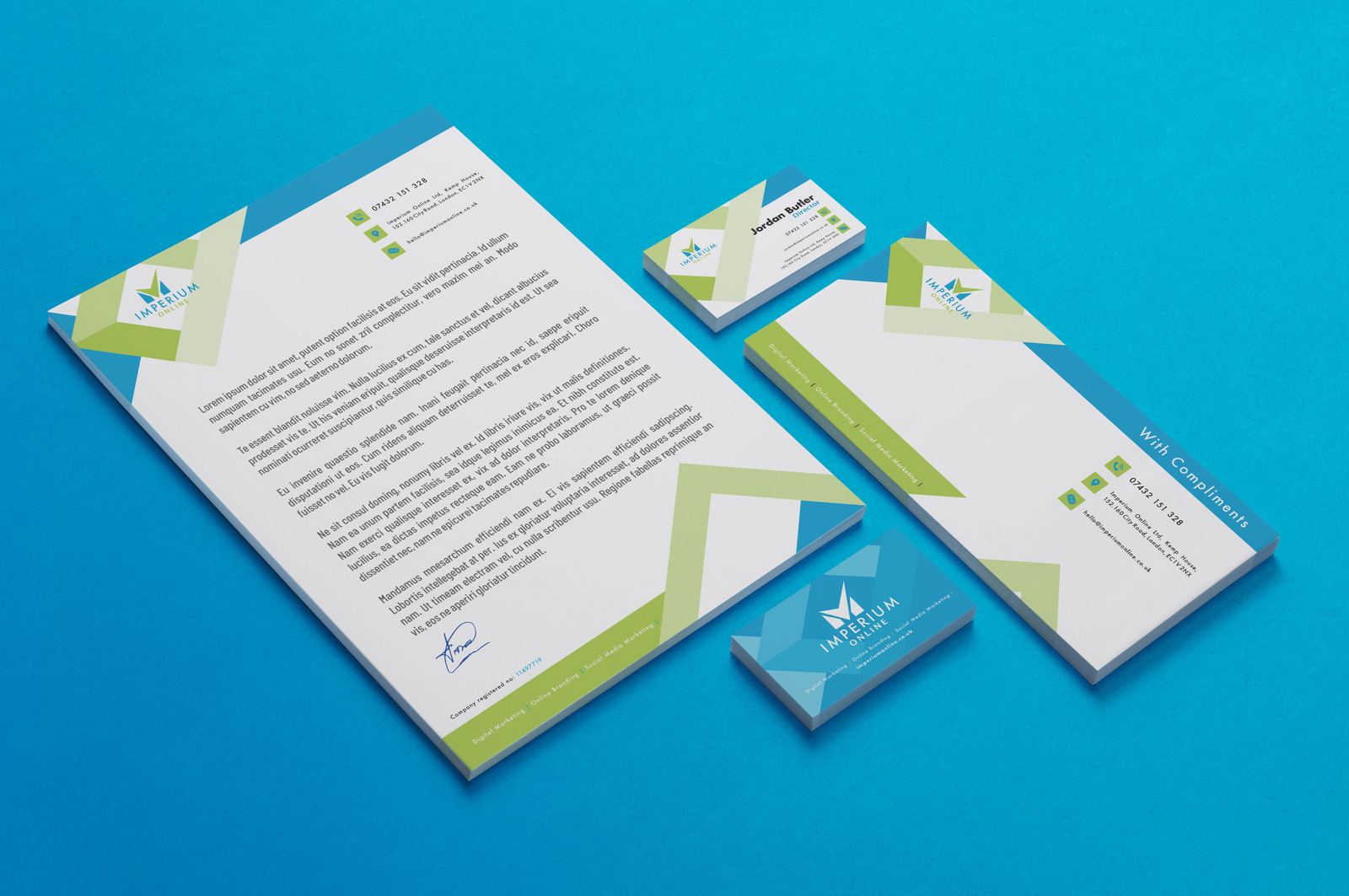 Imperium letterhead, compliments slip and business cards in blue and green